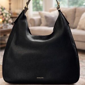 Michael Kors Nolita large pebbles Black Leather hobo bag